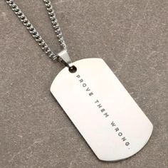 Just Restocked Sold Out Quick Grab This One Before It’s Gone Men’s Dogtag Style Necklace With Slogan Nwt Stainless Steel Dog Tag With Slogan Saying “ Prove Them Wrong” Tag Itself Is Easily Detachable * As Shown In Pictures See For Example Tag Is 2 Inches In Total Length And 1 Inch In Width Can Be Unisex Would Look Great On Anyone. Chain Is 22 Inches Long Great Gift Idea- The Back Of The Tag Is Blank So You Could Get It Personalized/ Engraved Item 4341 Smoke & Animal Free Home Packaged With Care Anniversary Stainless Steel Dog Tag Necklace, Nickel-free Dog Tag Necklace Gift, Stainless Steel Dog Tag Necklace With Adjustable Chain, Metal Dog Tag Necklace With Chain, Metal Dog Tag Necklace With Chain Detail, Prove Them Wrong, Trendy Boutique, Mens Accessories Jewelry, Style Necklace