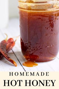 homemade hot honey recipe in a jar with chili peppers