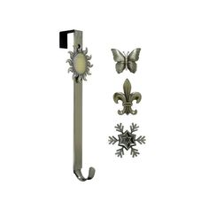 a metal door handle and some decorative decorations on it's side, including a fleur de lis