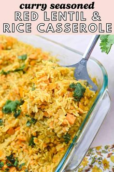 a glass casserole dish filled with red lentil and rice, garnished with cilantro