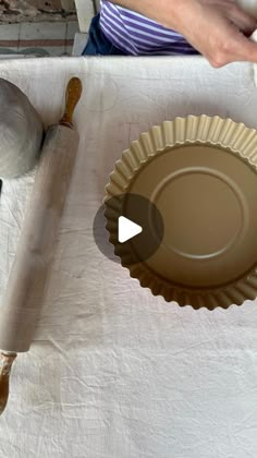 an image of a paper plate being prepared to be made into pie crusts or cupcake tins