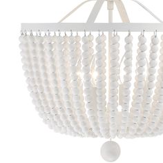 a white chandelier with beads hanging from it