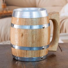 a wooden barrel sitting on top of a table