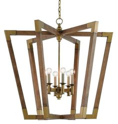 a chandelier made out of wood and metal with four lights hanging from it