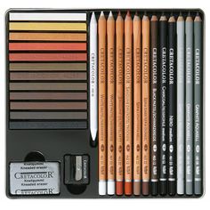 an assortment of colored pencils in a black case