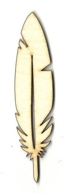 a wooden cutout of a feather