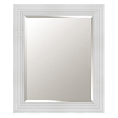 a white framed mirror on a wall with an empty space for the reflection to be seen