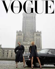 two women standing in front of a black car on the cover of a magazine,