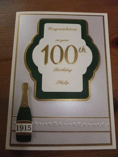 a birthday card with a bottle of champagne