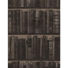 an old book shelf with many books on it's shelves in black and white