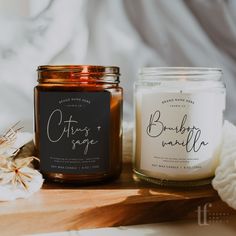 two candles sitting next to each other on a table