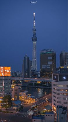 an airplane is flying over the city at night