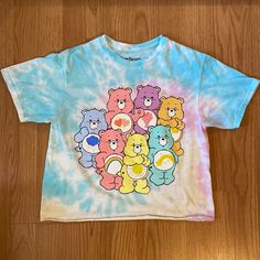 Care Bears Tee Size Small New Without Tags Nwot All Items Are Cross Listed On Other Platforms. Bundle To Save On Shipping And For An Additional Discount! Carebears Clothes, Blue Top With Rainbow Print For Spring, Blue Tops With Rainbow Print For Spring, Cute Multicolor Tops With Rainbow Print, Cute Multicolor Rainbow Print Tops, Playful Pink Tops With Rainbow Print, Blue Rainbow Print Crew Neck Top, Blue Crew Neck Top With Rainbow Print, Cute Tie Dye Crew Neck Top