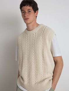 Editor's NotesMen Reversed Cable Knit Vest Cream from KNITLY is a semi-overfit knit vest product. It was woven into a cable pattern. It has a ribbed neckline and ends. It can be worn alone or layered with a t-shirt.- Semi-over fit- Round neck- Ribbed details- High quality stitchesMeasurements (in.)- 2- Length: 26.7 in.- Shoulder: 18.8 in.- Chest: 24.4 in.- Arm hole: 10.2 in.*Model Information- Height: 6'0 Waist: 28 Size: 2Composition & Care- 85% Cotton, 15% Flax- Dry Clean OnlyDesigner- by KNITLY Cable Knit Vest Men, Vest Top Outfits, Vest Outfits Men, Knitting Vest, Knit Vest Outfit, Knitwear Details, Cream Outfit, Cable Knit Vest, Cable Pattern