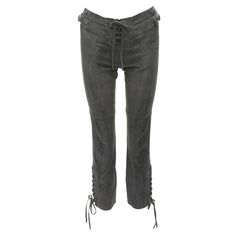 ISABEL MARANT grey suede leather side buckles lace up cropped pants Reference: NKLL/A00205 Brand: Isabel Marant Material: Suede Color: Grey Pattern: Solid Closure: Zip Lining: Grey Fabric Extra Details: Buckles at sides and lace up details at hem. CONDITION: Condition: Very good, this item was pre-owned and is in very good condition. Please refer to image gallery for thorough condition check. Dented leather at buckles and tip of leather there is a bit scuffed. Remarks: The brand label is not pre Pants Reference, Zip Lining, Brand Label, Grey Suede, Grey Pattern, Gray Suede, Grey Fabric, Image Gallery, Isabel Marant