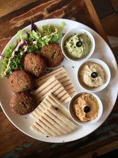 a white plate topped with different types of food