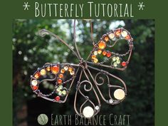 the butterfly is made out of wire and glass beads