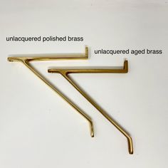 three brass colored metal handles on a white background with the words untaquered polished brass