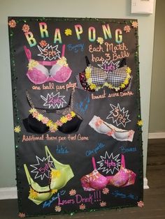 a chalkboard sign with bras on it