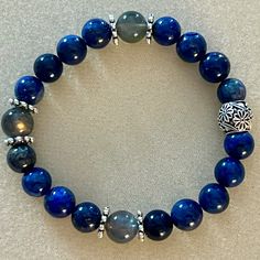 New Pretty Lapis Lazuli & Labradorite Beaded Elastic Bracelet. Beads Are 8 Mm. Bracelet Fits Wrists Up To 7 Inches Long. Lapis Lazuli Crystal, Labradorite Beads, Elastic Bracelet, Women Accessories Jewelry, Womens Jewelry Bracelets, Lapis Lazuli, Blue And Silver, Women's Jewelry, Labradorite