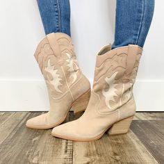 Talk about a showstopper!! This beautiful two-tone design is eye catching & on trend with it's western styling. Perfect to wear with everything from skinny jeans to dresses!! Suede upper Shaft height approximately 7.9" Leg circumference approximately 13.4" Heel height approximately 2.4" 2.6" Heel Height Shoe Boutique, Gift Item, Talk About, Cowboy Boots, Leather Handbags, Two Tone, Heel Height, Cute Outfits, Boots