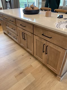 a large kitchen island with two bowls on it