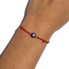 "🧿 SUMMER SALE 2021 🧿 You are looking at the trendy Red String Navy Blue Glass Evil Eye Adjustable Bracelet. Video Tutorial: https://youtu.be/LFSR8Q2q2x4 The History of the Evil Eye: The evil eye is one of the strongest and most powerful ancient symbols in the world. It dates back as early as 5000 BC in Mesopotamia and has roots in Christian, Jewish, Muslim, Buddhist, and Hindu cultures. The evil eye's roots run deep, worn daily in antiquity and today, and for good reason. The Power and Symbol Adjustable Red Charm Bracelet, Adjustable Red Round Charm Bracelet, Adjustable Round Red Charm Bracelet, Red Resizable Bracelets As Gift, Red Resizable Bracelets Perfect For Gifts, Gift Red Resizable Bracelets, Red Evil Eye Braided Bracelet Gift, Red Braided Bracelet With Evil Eye For Gift, Handmade Red Evil Eye Bracelet