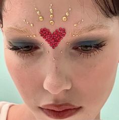 Sparkly Makeup With Jewels, Makeup Gem Looks, Halloween Gem Makeup, Gold Gem Makeup, Gem Makeup Looks, Makeup Looks With Gems, Heart Makeup Look, Cupid Makeup, Heart Eye Makeup