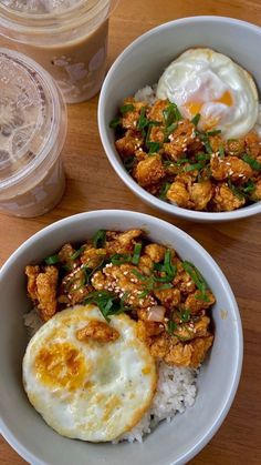 two bowls filled with rice and fried eggs