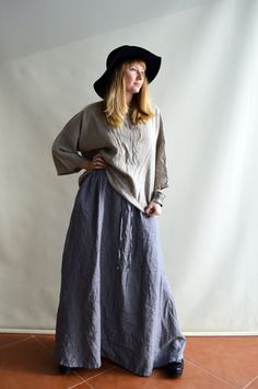 "Linen maxi skirt with pockets. Enjoy the freedom and comfort provided by these fantastic linen skirts. Great texture and lovely wrinkles. Adjust them with a drawstring in the front (the back has elastic) Each piece is individually cut, sawn and pre-washed. We really love making skirt for various sizes - from petit to plus size and more. For the best fitting of this skirt please let us know the following measurements: - your height - your waist circumference - your hip circumference - how long y Spring Full Length Skirt With Side Pockets, Spring Full-length Skirt With Side Pockets, Full Length Skirt With Side Pockets For Spring, Relaxed Maxi Skirt With Pockets, Relaxed Full-length Skirt With Pockets, Relaxed Fit Long Maxi Skirt, Full-length Relaxed Skirt With Pockets, Full-length Skirt With Pockets, Casual Long Skirt With Loosely Fitted Hips