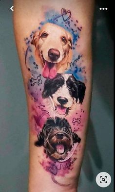 a tattoo with three dogs on it