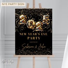 new year's eve party sign on an easel with fireworks in the background