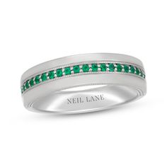 This emerald wedding band from the Neil Lane® collection confirms your commitment. 14K white gold Round-cut emeralds line the center of the band Milgrain detailing adds distinction to the design Classic Formal Emerald Ring Channel Set, Classic Formal Emerald Ring With Channel Set, Formal Emerald Ring With Channel Set Round Cut, Formal Channel Set Round Cut Emerald Ring, Formal Channel Set Emerald Ring, Lannister Fashion, House Lannister, Emerald Wedding Band, Levian Jewelry