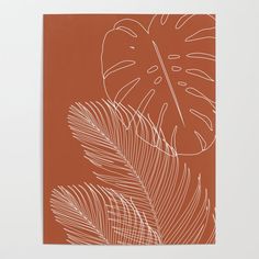 an orange and white print with leaves on it