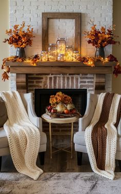 a living room filled with furniture and a fire place covered in fall leaves next to a fireplace