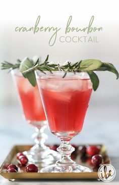 two glasses filled with cranberry punch on a tray