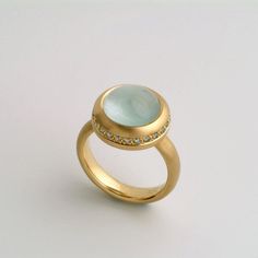 Large Natural Aquamarine Cabochon Ring 18k Gold for Women | Etsy Elegant Moonstone Ring With Aquamarine Gemstone, Modern Round Cabochon Emerald Ring, Modern Aquamarine Ring For Wedding, Elegant Round Cabochon Topaz Ring, Elegant Blue Topaz Cabochon Ring, Modern Aquamarine Wedding Ring, Modern Yellow Gold Round Moonstone Ring, Luxury Light Blue Round Rings, Luxury Light Blue Round Ring