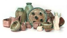 there are many vases and bowls on the table with words above them that read tuf sells mccarty pottery click to learn more