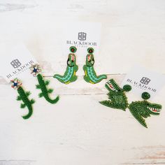 These earrings are so cute and fun! Perfect for game day or for an alligator lover! 3"x1 1/2" Free shipping & free gift included with purchase! Beaded Alligator, Simple Earrings, Painting Crafts, Fun Things, Textile Art, Game Day, Free Gift, Alligator, Beaded Earrings