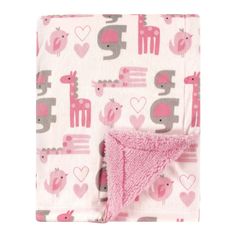 a pink blanket with giraffes and hearts on it