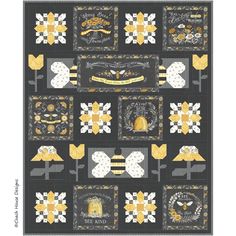 a quilt with yellow and white flowers on the front, and black background that says happy birthday