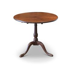 an old fashioned wooden table with two legs and a small round top, on a white background