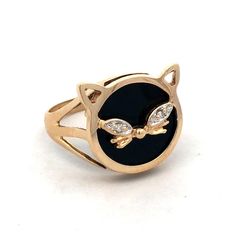 * Designer 10K Yellow Gold Round Black Onyx White Topaz Cat Pet Ring * Ring size: 6.25  * Band width: 2.3 mm  * Top of ring measures: 9/16" x 5/8" * Height: 1/8" * Weight: 3.3 tgw * 1 Round Onyx measures approximately 13 mm  * 2 Round Topaz measure approximately 1 mm each * Ring can be resized for an additional fee.  * Marked: Makers Mark * 10KP  * Condition: As pictured. ( H )  * G4547    Exported By ExportYourStore :) Cat Pet, Ring Ring, White Topaz, Makers Mark, Black Onyx, Pets Cats, Topaz, Onyx, Jewelry Rings