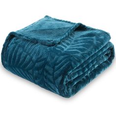 a blue blanket folded on top of each other