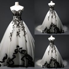 a white and black wedding dress with flowers on it