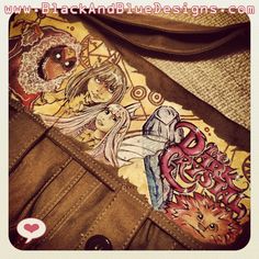 the back pocket of a purse with some drawings on it