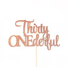 there is a cake topper that says, thirty onederful on the side