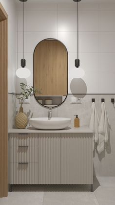 a bathroom with a sink, mirror and hanging lights