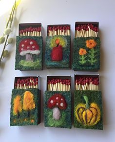 four matches are decorated with different types of mushrooms