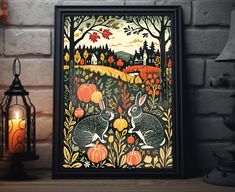 a framed art print of two rabbits in a pumpkin patch